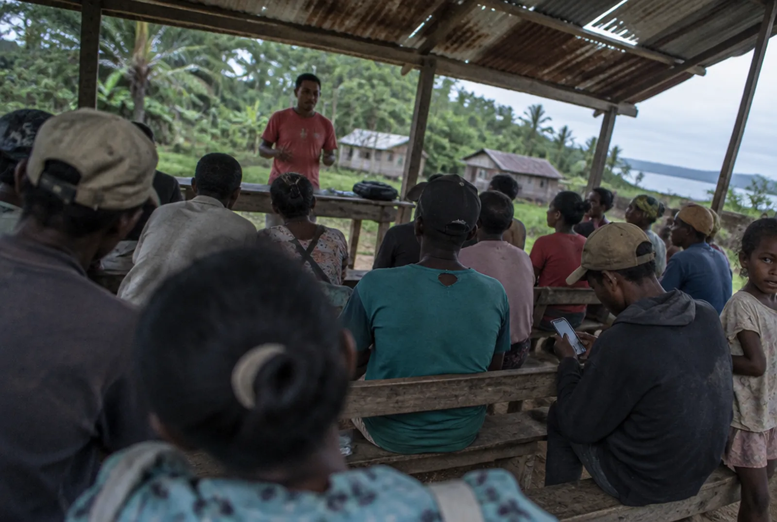 Vanilla growers attending a training session under an open shed near Maroantsetra Vanilla growers attending a training session under an open shed near Maroantsetra